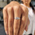 The 2 trillion side stone design adds a bold and modern twist.
