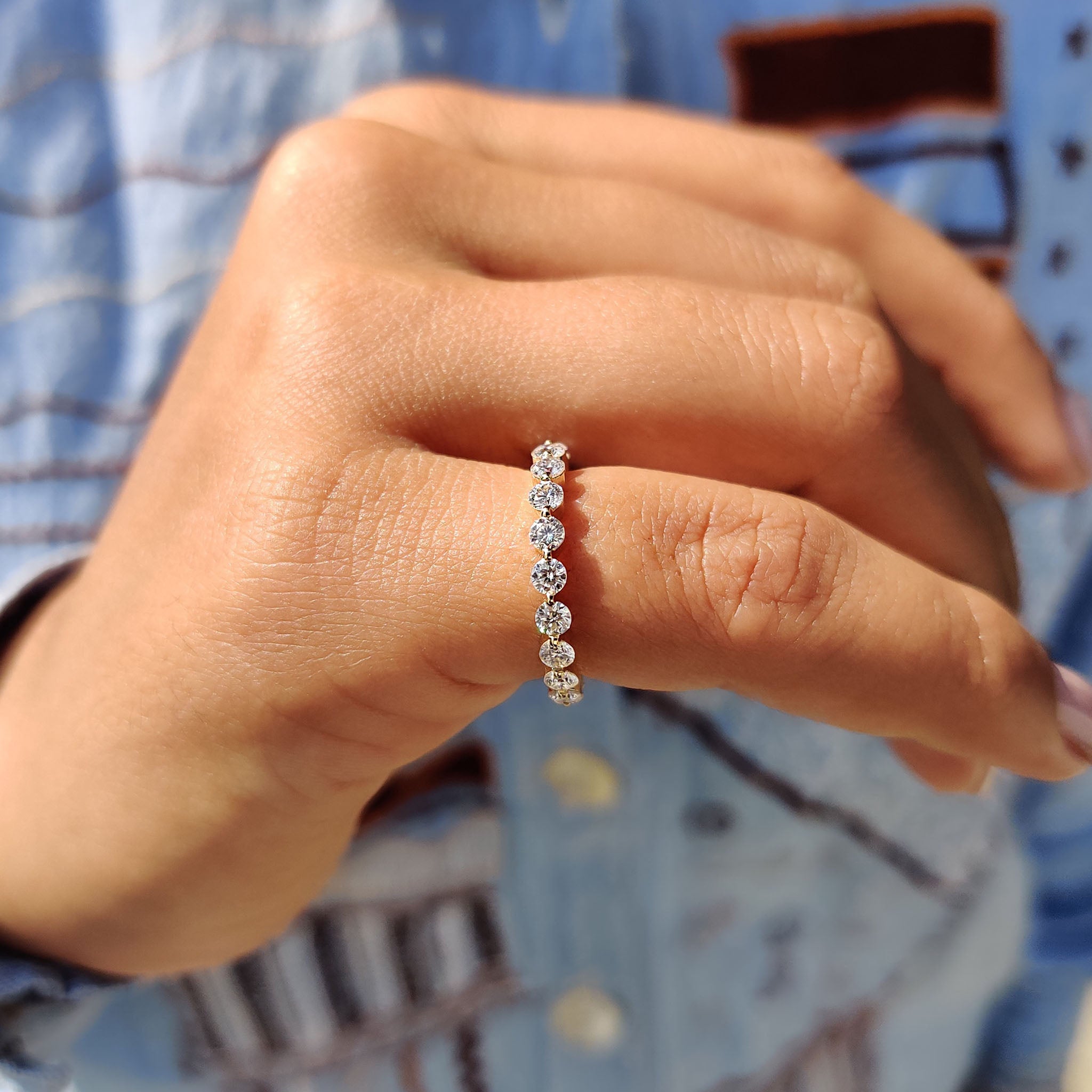 Full eternity band in yellow gold with bubble prong settings for added charm.\