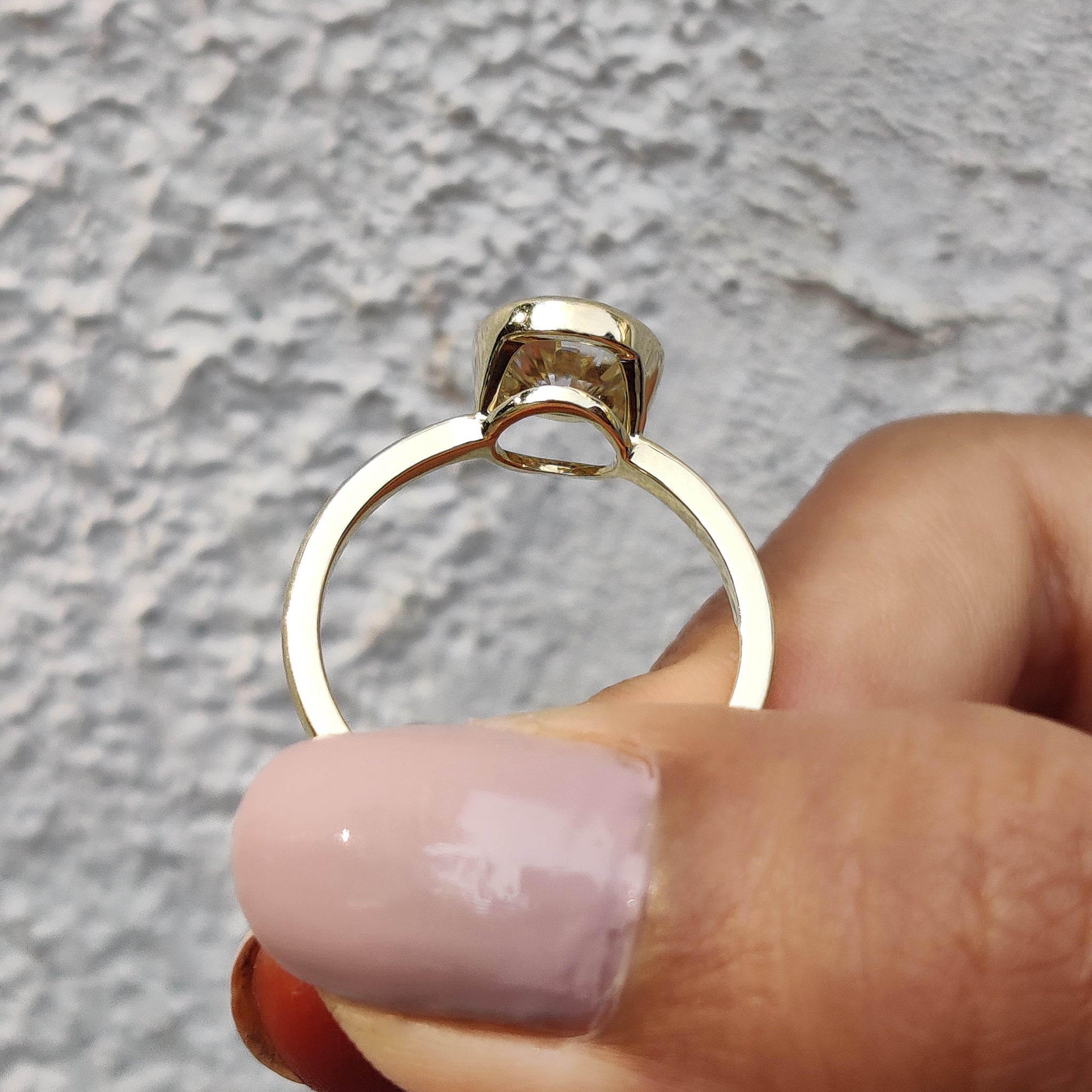 Bezel Ring offering a modern, minimalistic look.