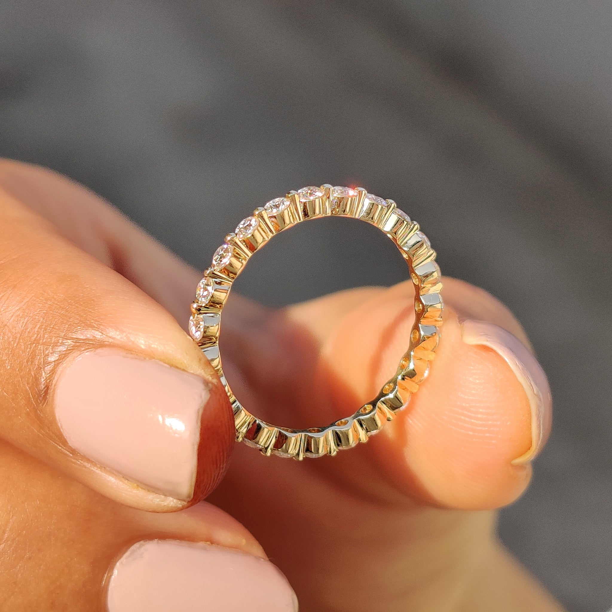 Custom wedding band crafted with Moissanite stones for a personalized touch.