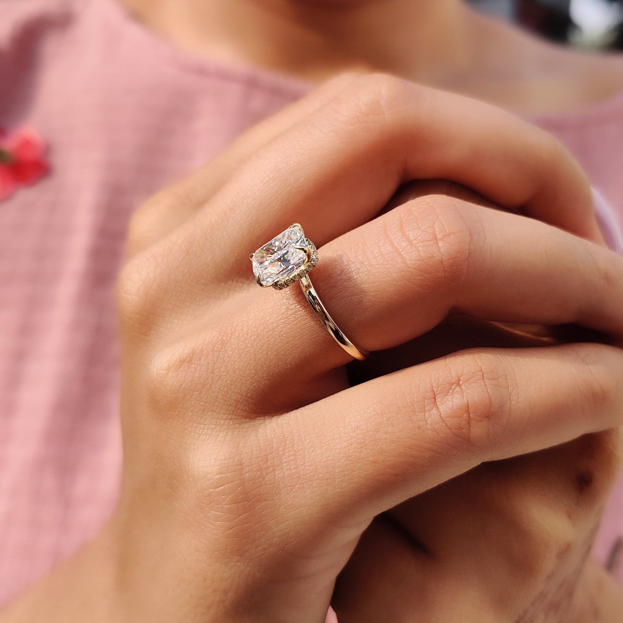 Gold engagement ring with antique cushion cut style.