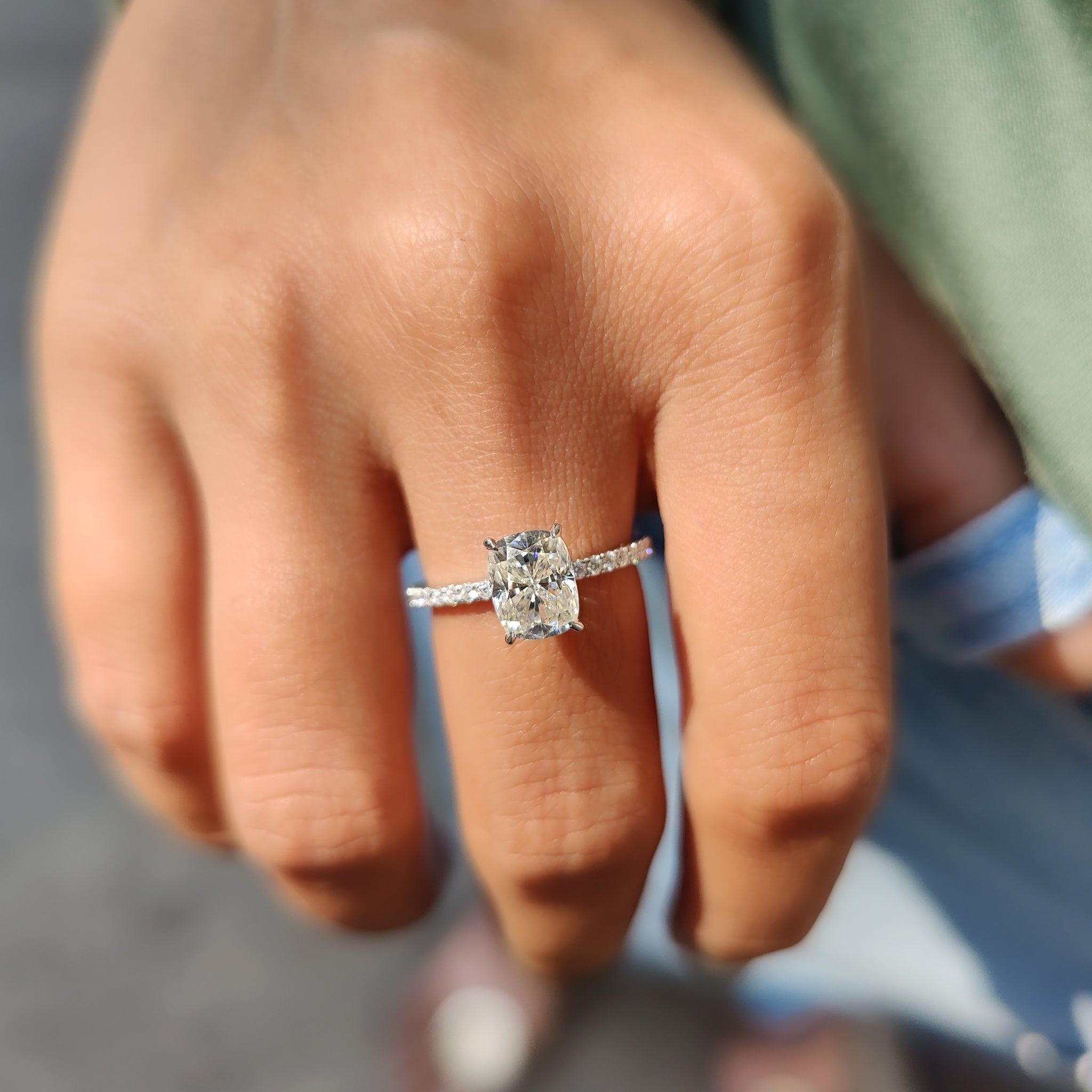 Cushion cut engagement ring in white gold.