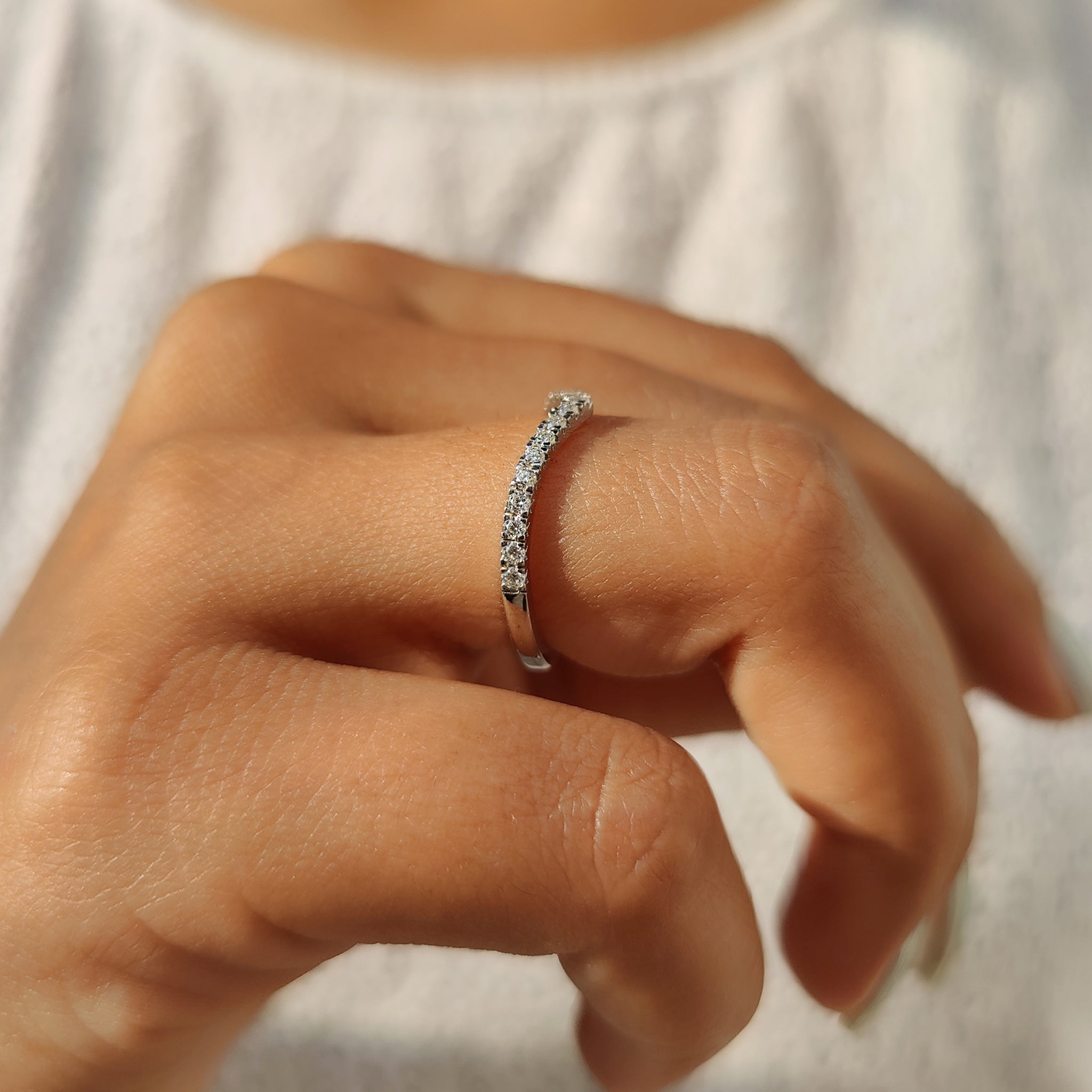 Moissanite wedding band in chevron style.
