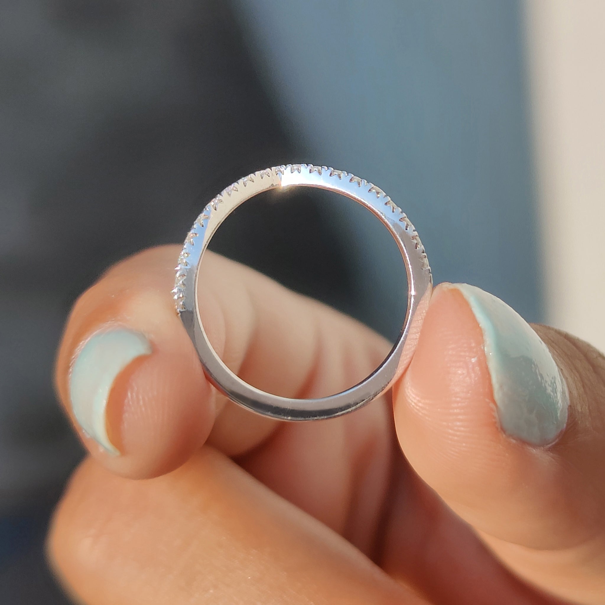 Handmade band with white gold finish.
