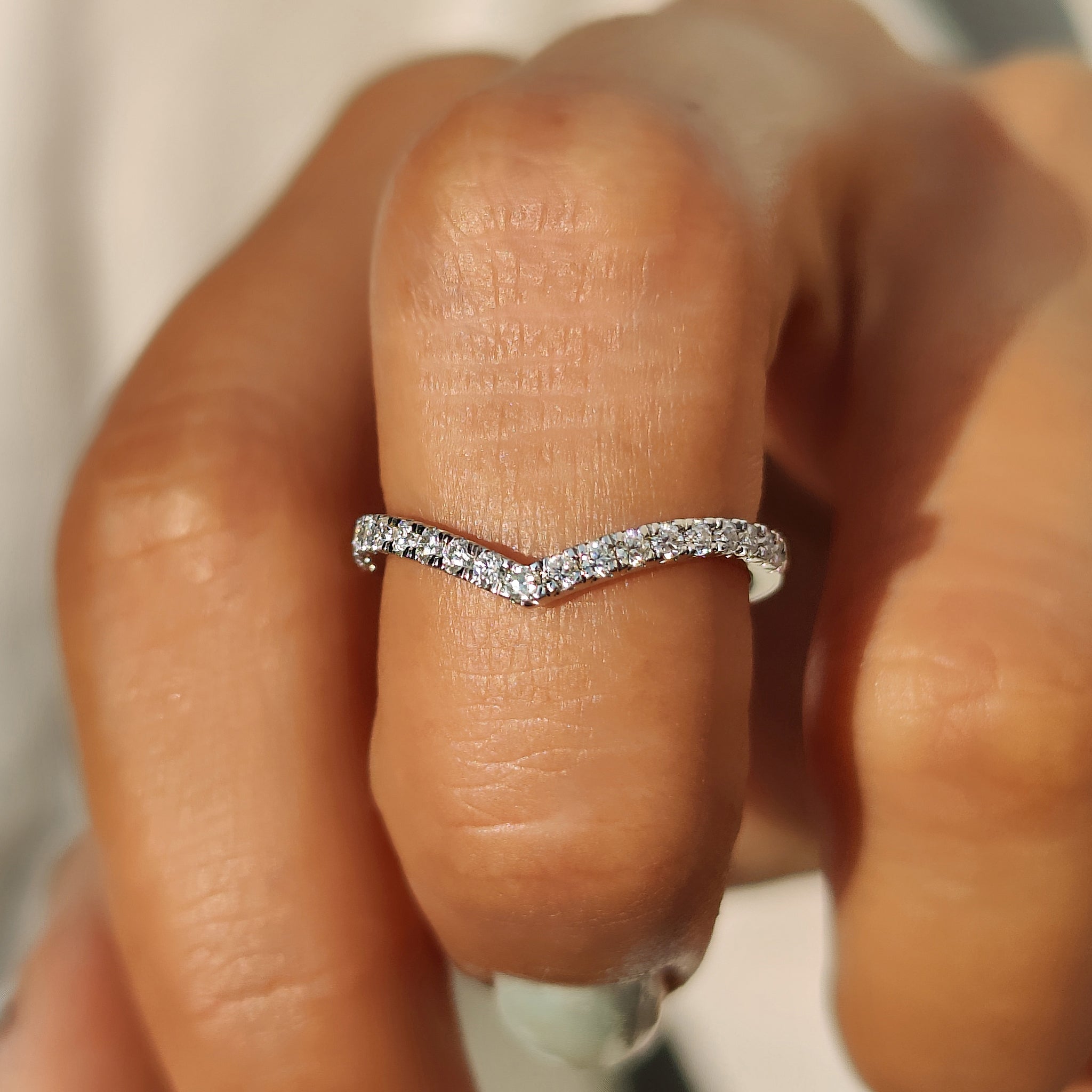 Carat diamonds wedding band in chevron design.
