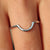 Curved wedding band white gold paired with stackable wedding band.