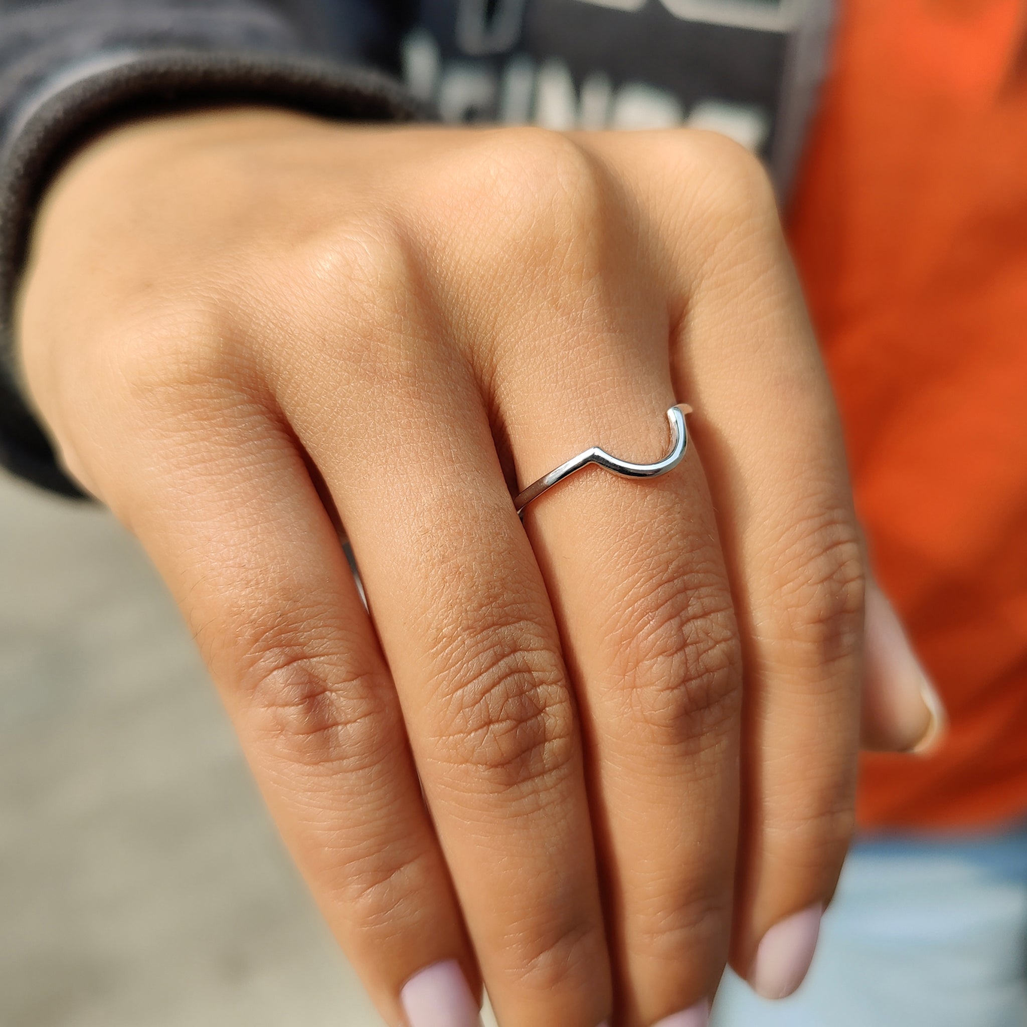 Stackable wedding band with white gold band for effortless stacking.