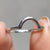 Carat Diamonds band featured alongside curved wedding band white gold.