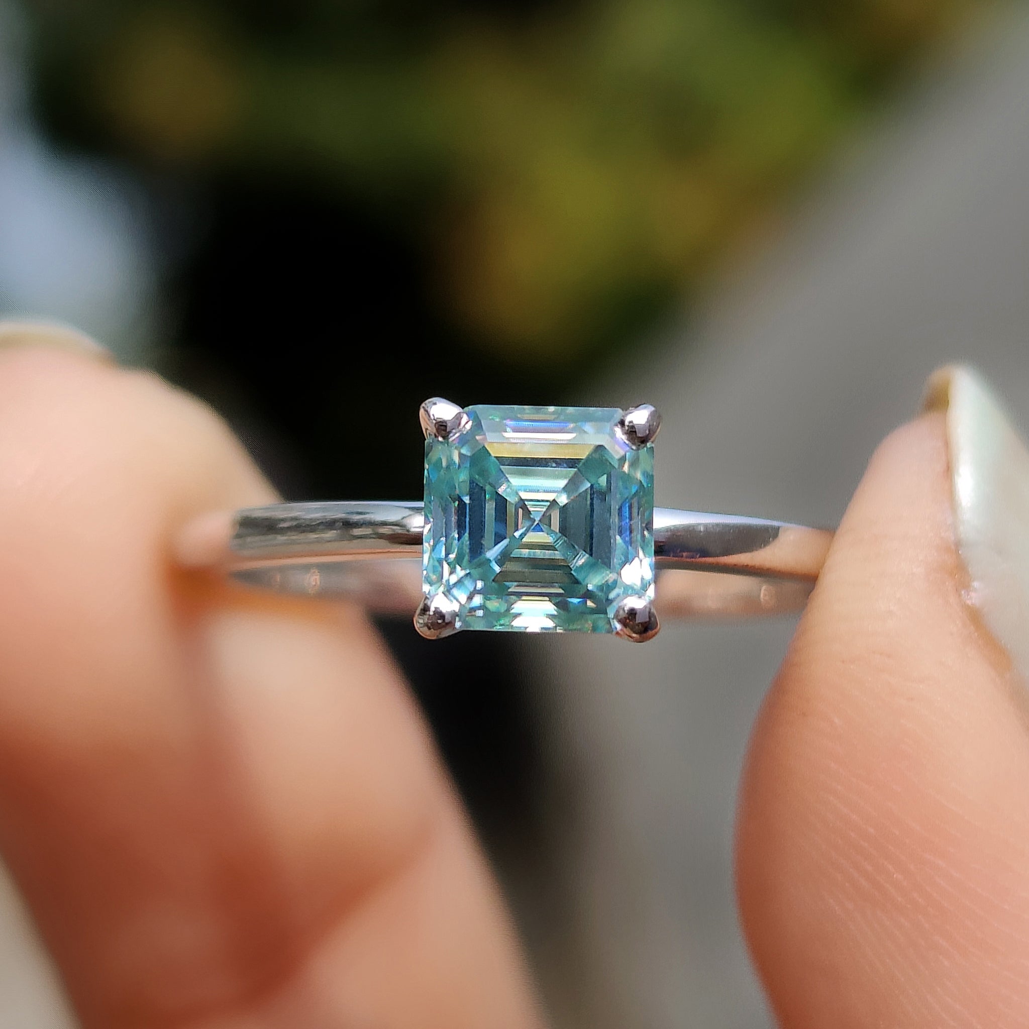 Asscher moissanite ring with a prong setting.