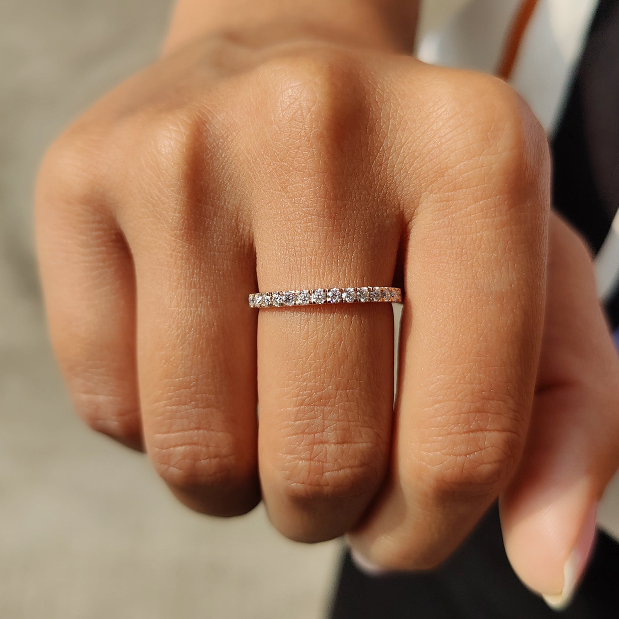 Stackable moissanite band and simple wedding band offer endless pairing options.