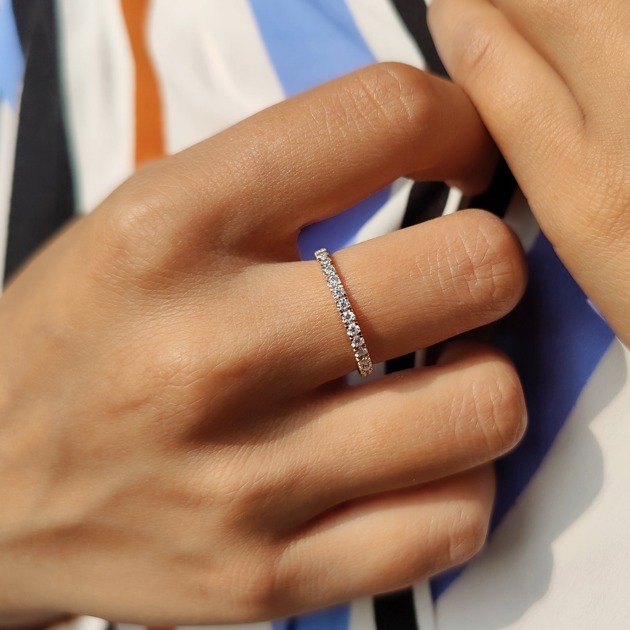 The moissanite wedding band and handmade band are crafted for beauty.
