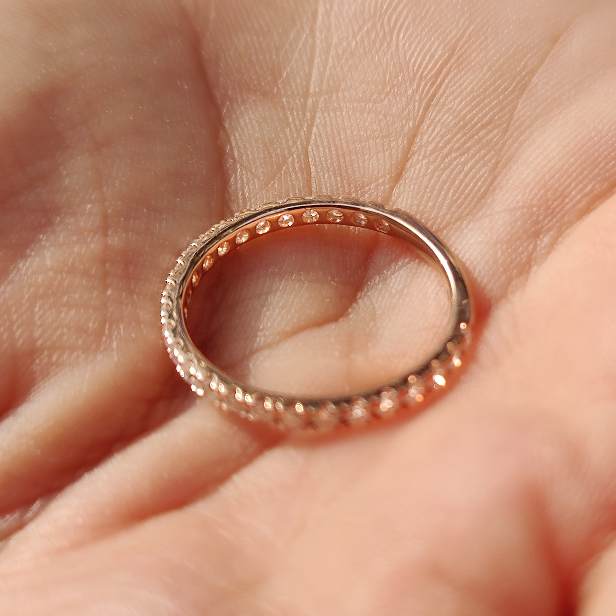 The 3/4 eternity band and rose gold moissanite band complement each other perfectly.