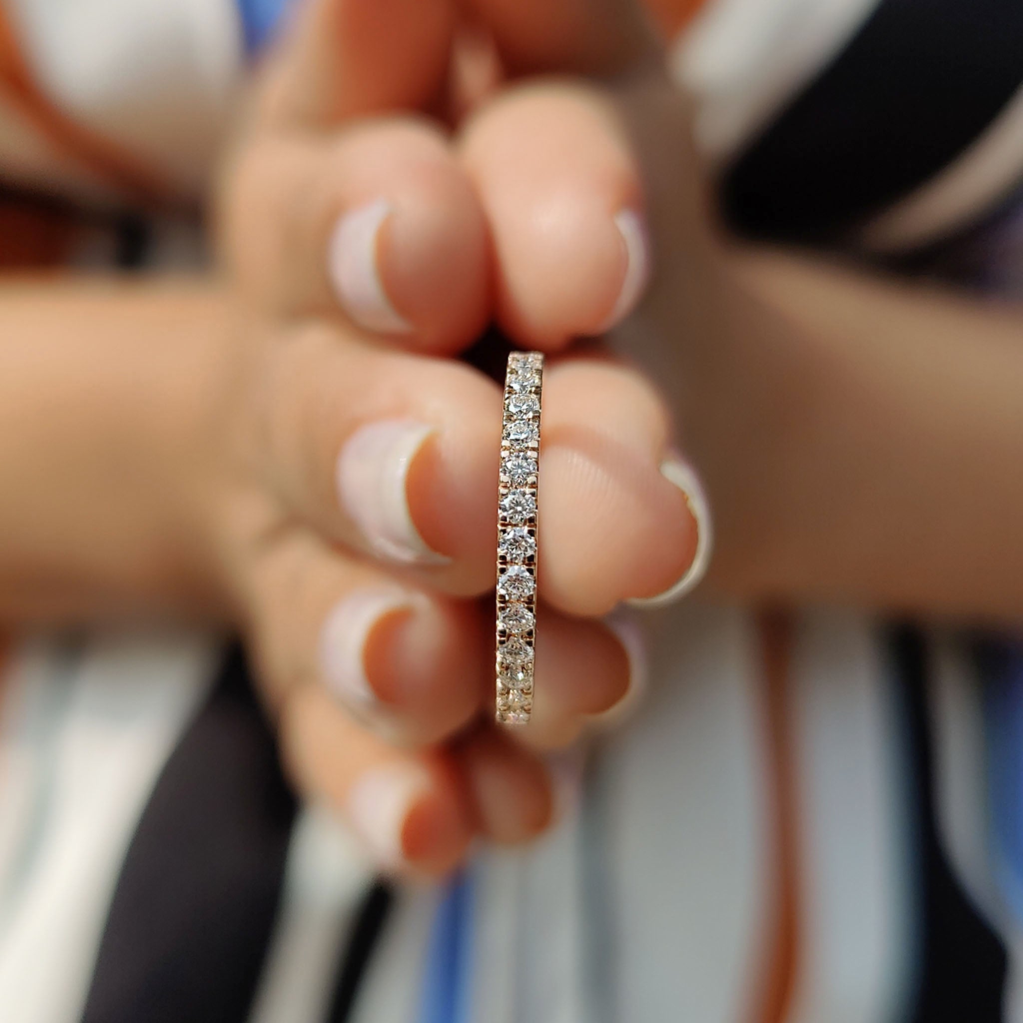 The carat diamonds wedding band and 3/4 eternity band provide a cohesive design.