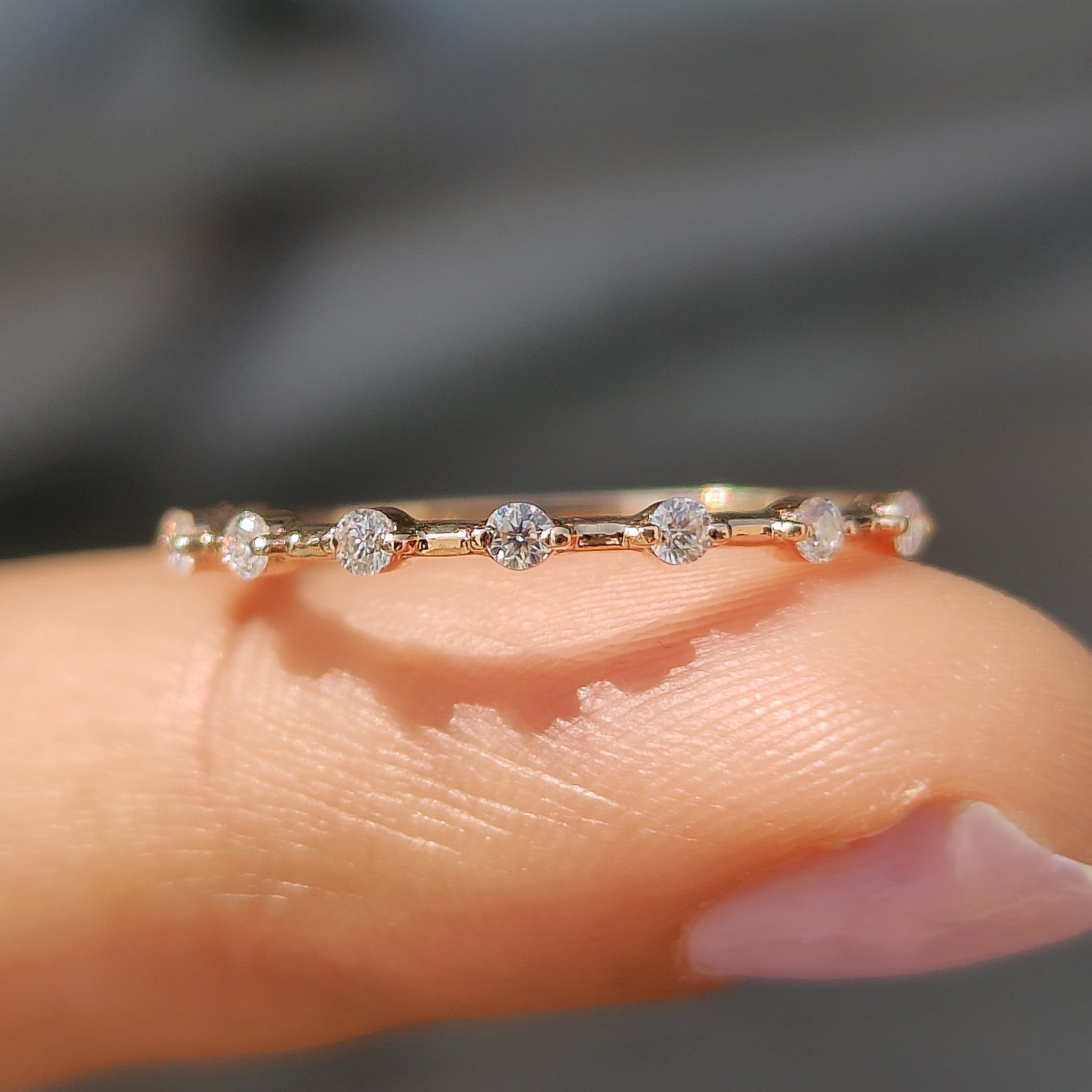 Rose gold wedding band with a sleek design.