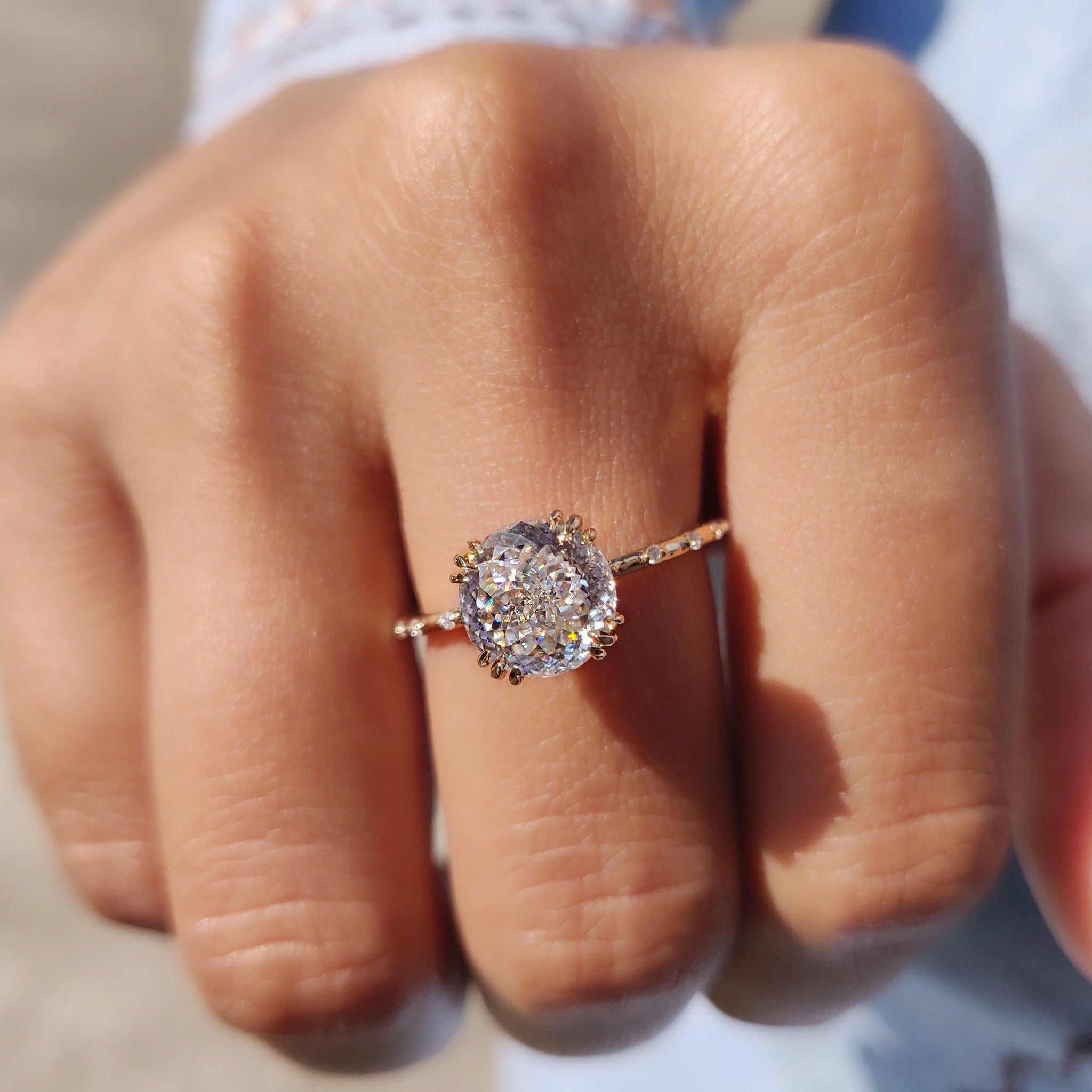 This fishtail setting ring adds graceful texture to the design.