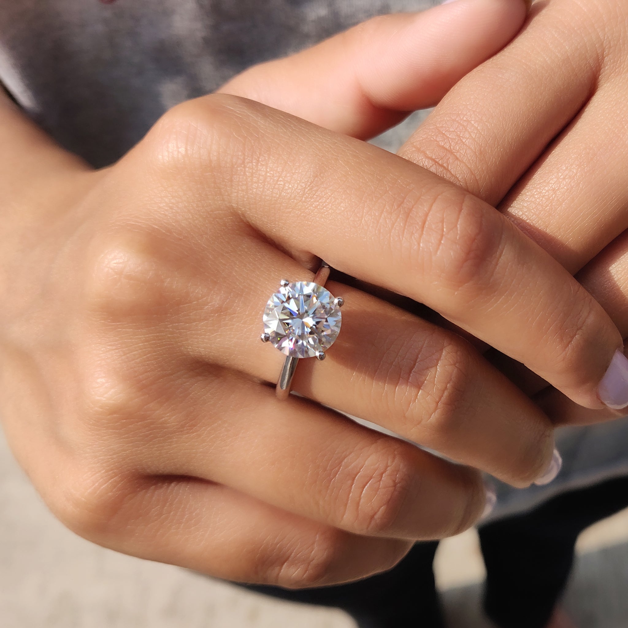 Handmade jewelry with moissanite and 4 prongs.