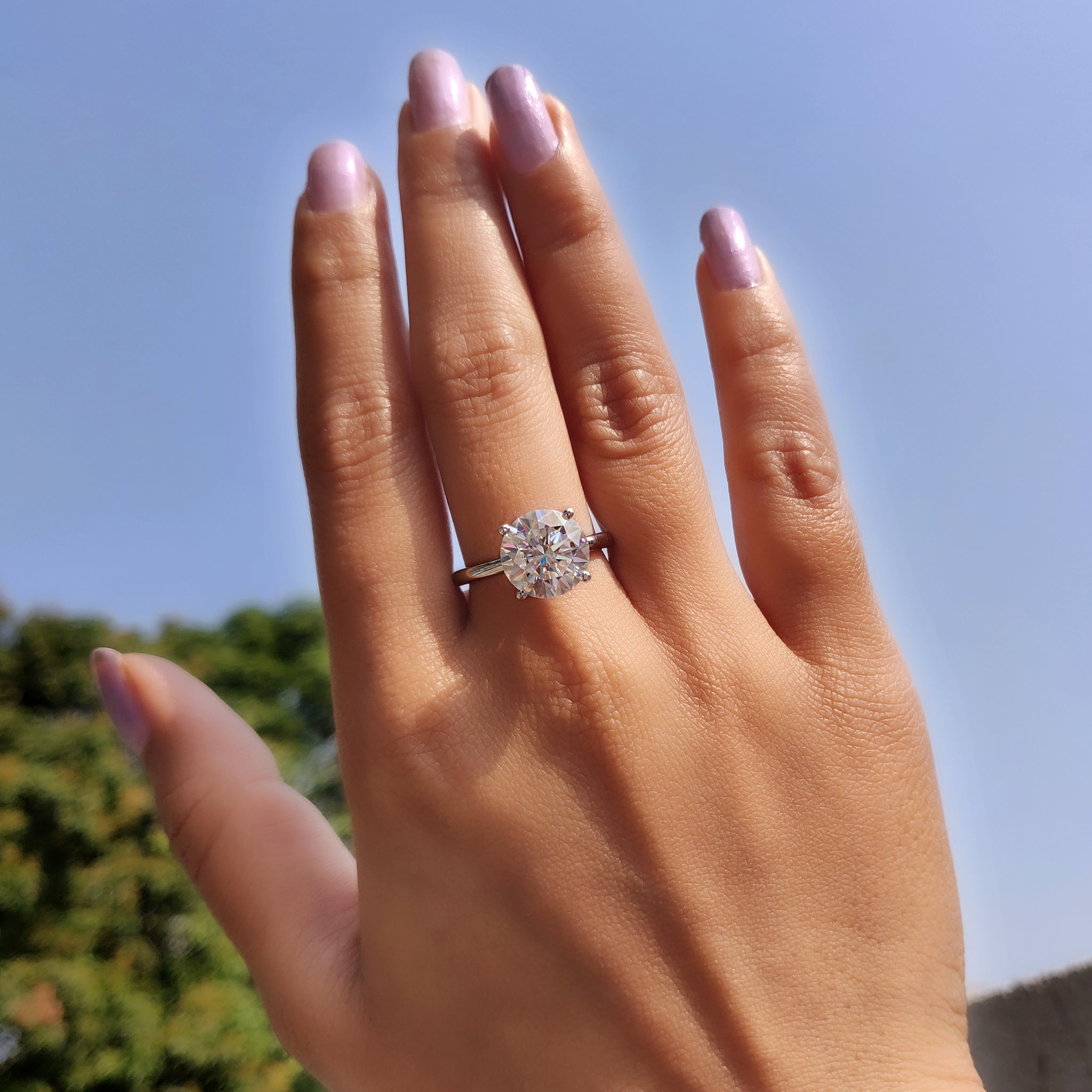 Moissanite ring in a simple round design.