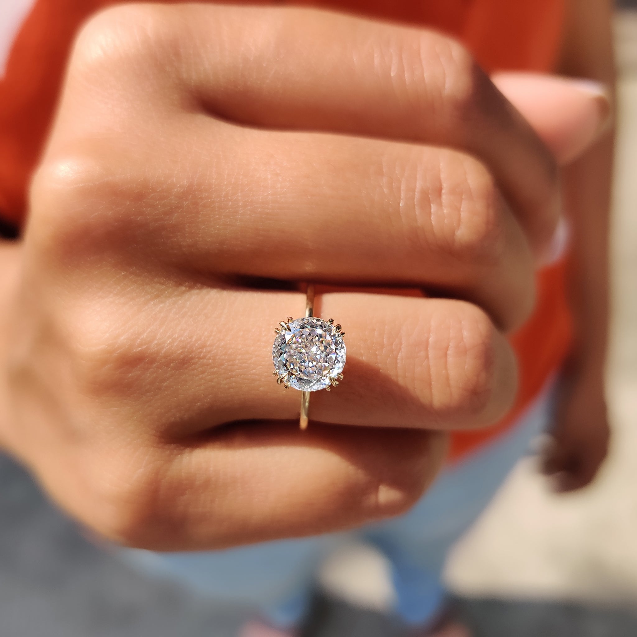 Moissanite ring with soft curves and a simple, modern silhouette
