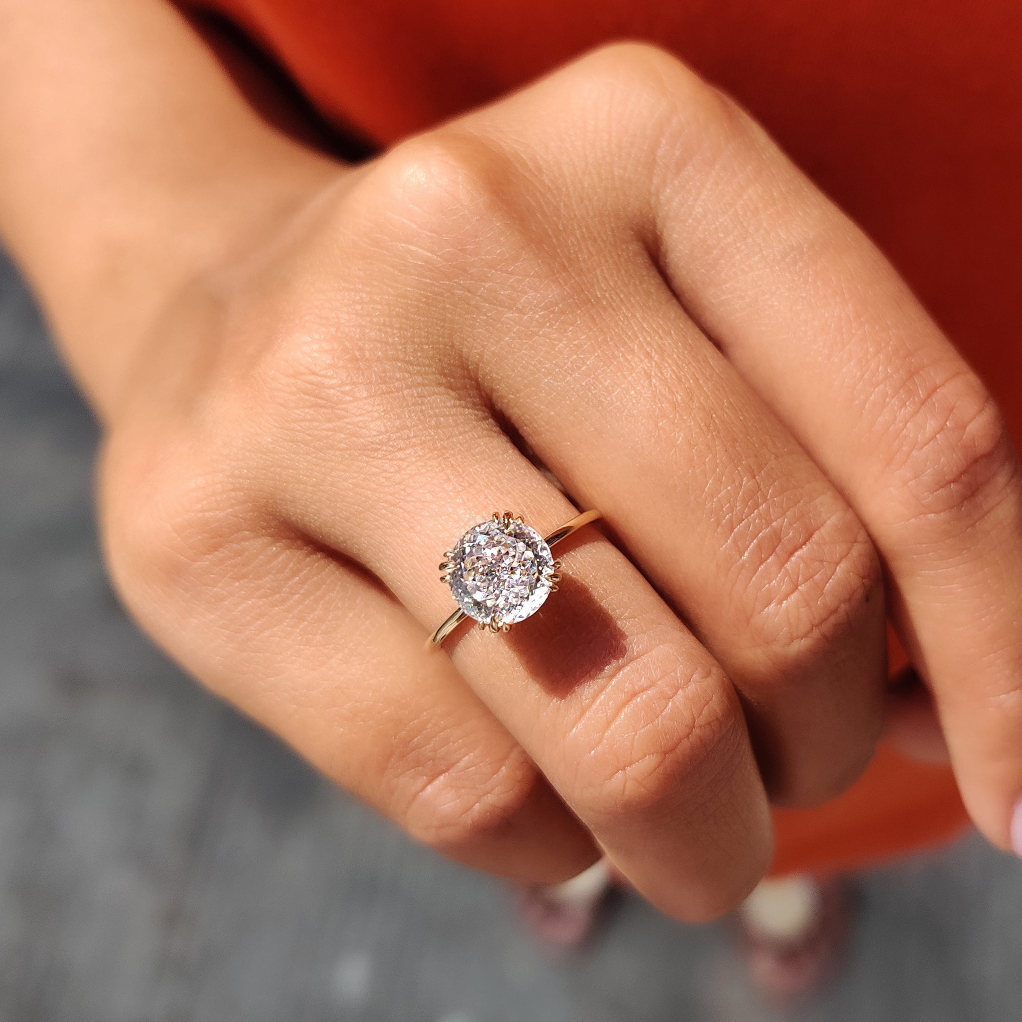 Handmade ring set on a rustic surface, showcasing artisanal detail
