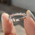 A custom moissanite band and a moissanite wedding band make a unique set.