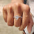 This pear cut moissanite ring offers a unique and elegant shape.