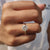 A round cut moissanite ring offers brilliant symmetry.