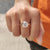 The solitaire round engagement ring shows off timeless beauty.