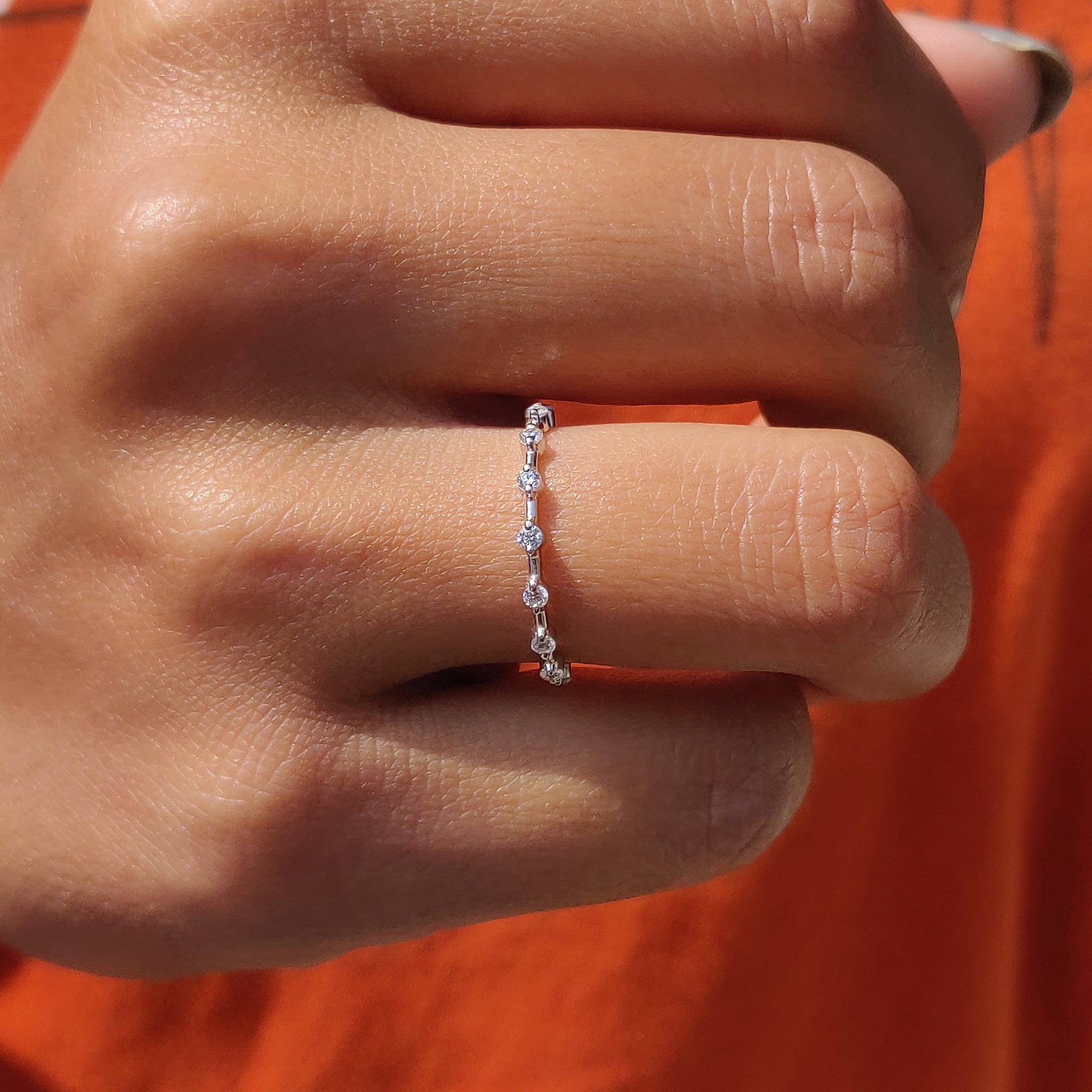 Distance pave wedding band for a modern touch.