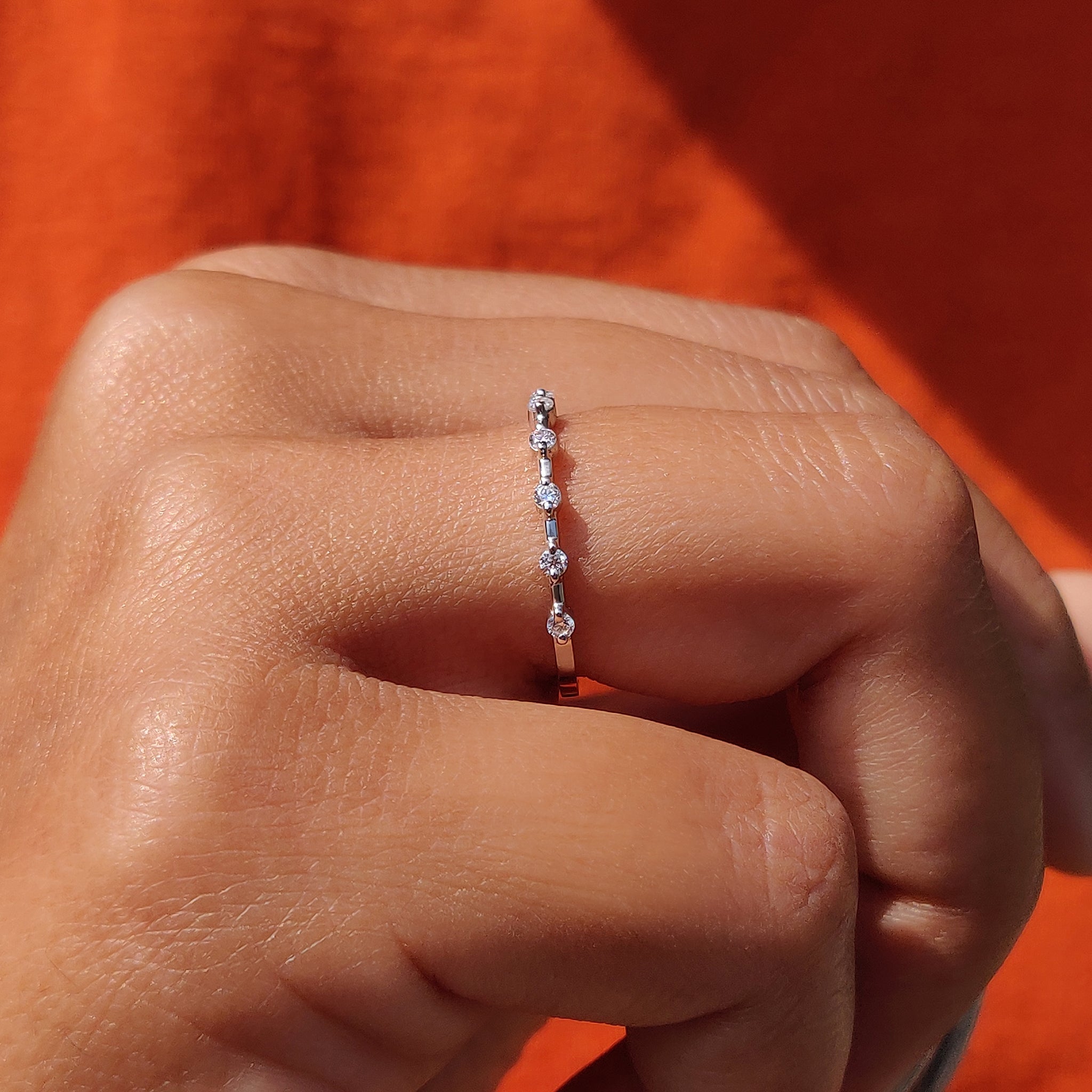 White gold moissanite band for a refined style.