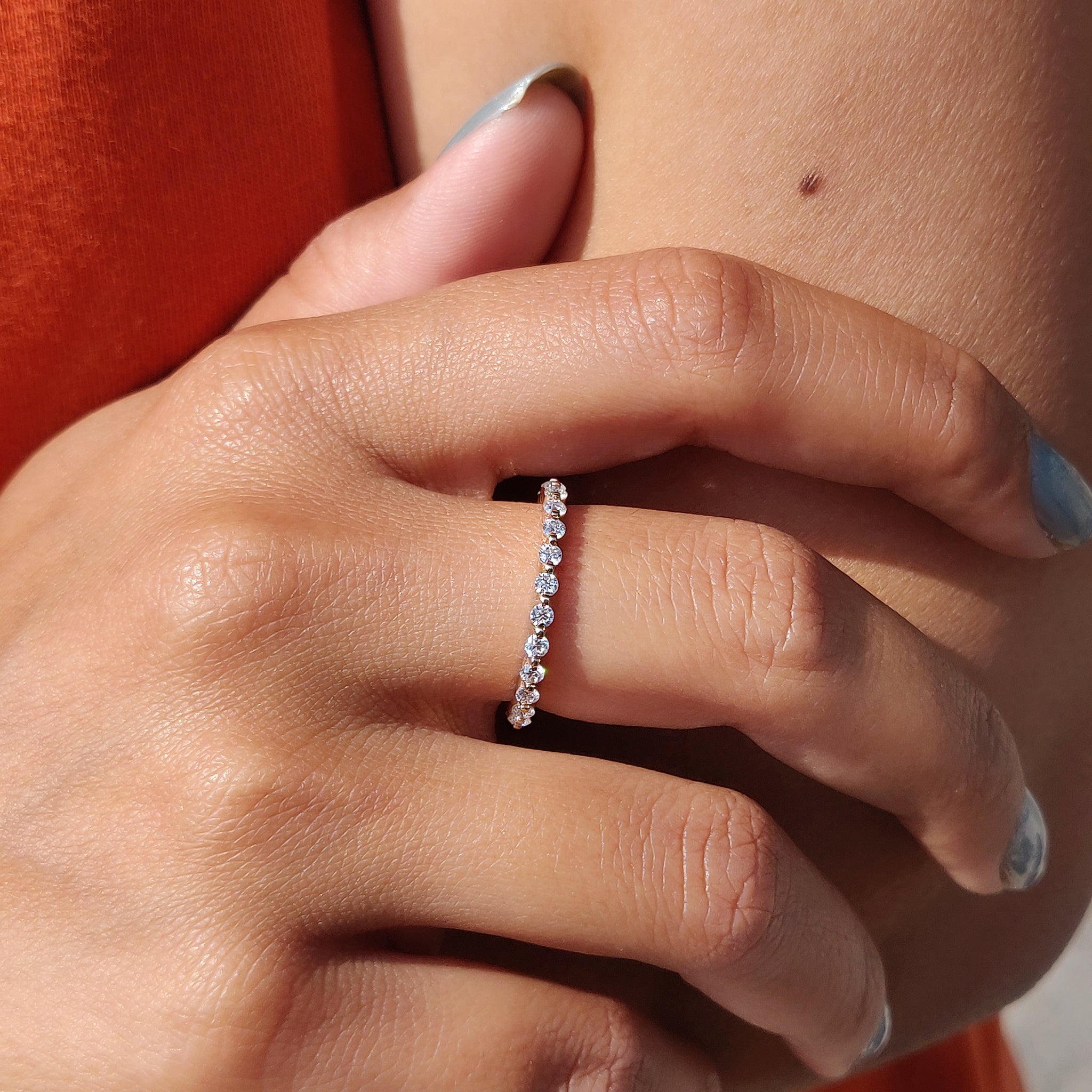 Prong set band in rose gold with dazzling diamonds for added shine.