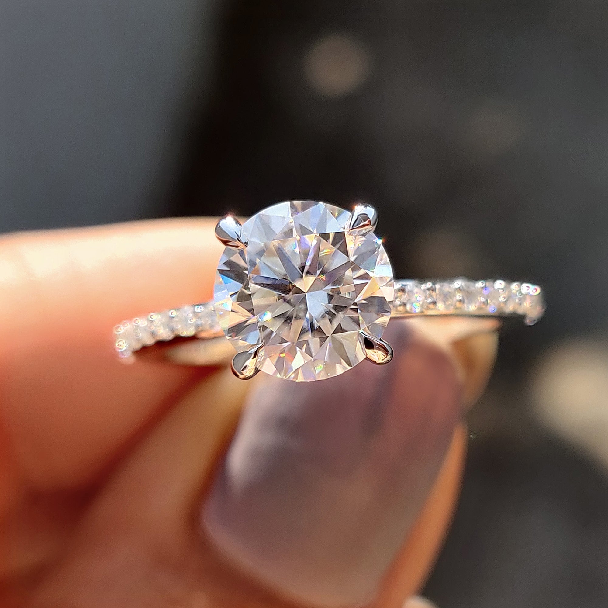 This hidden halo engagement ring features a sparkling hidden detail beneath the center stone.
