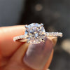 This hidden halo engagement ring features a sparkling hidden detail beneath the center stone.
