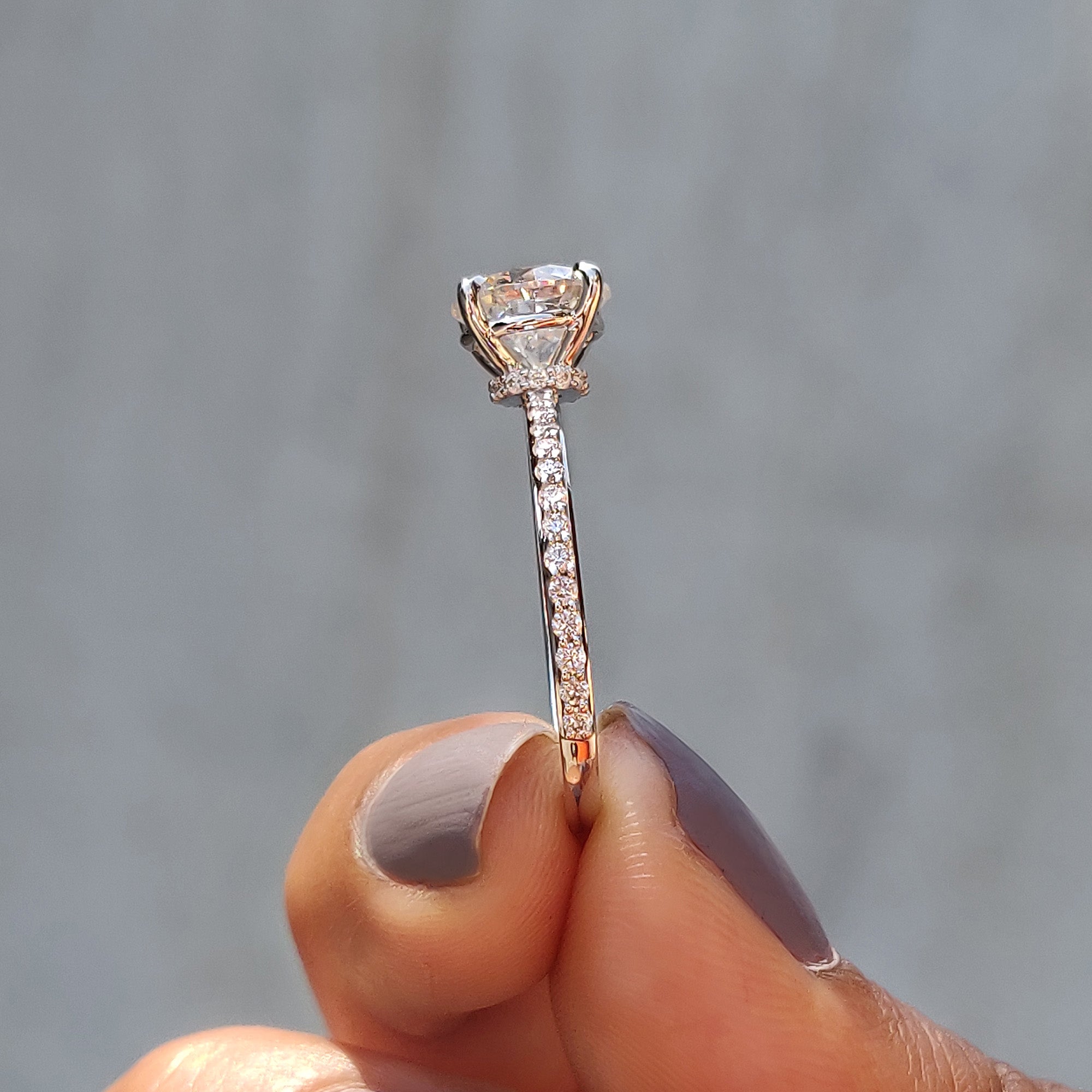 The white gold engagement ring provides a classic and cool-toned setting for any gemstone.
