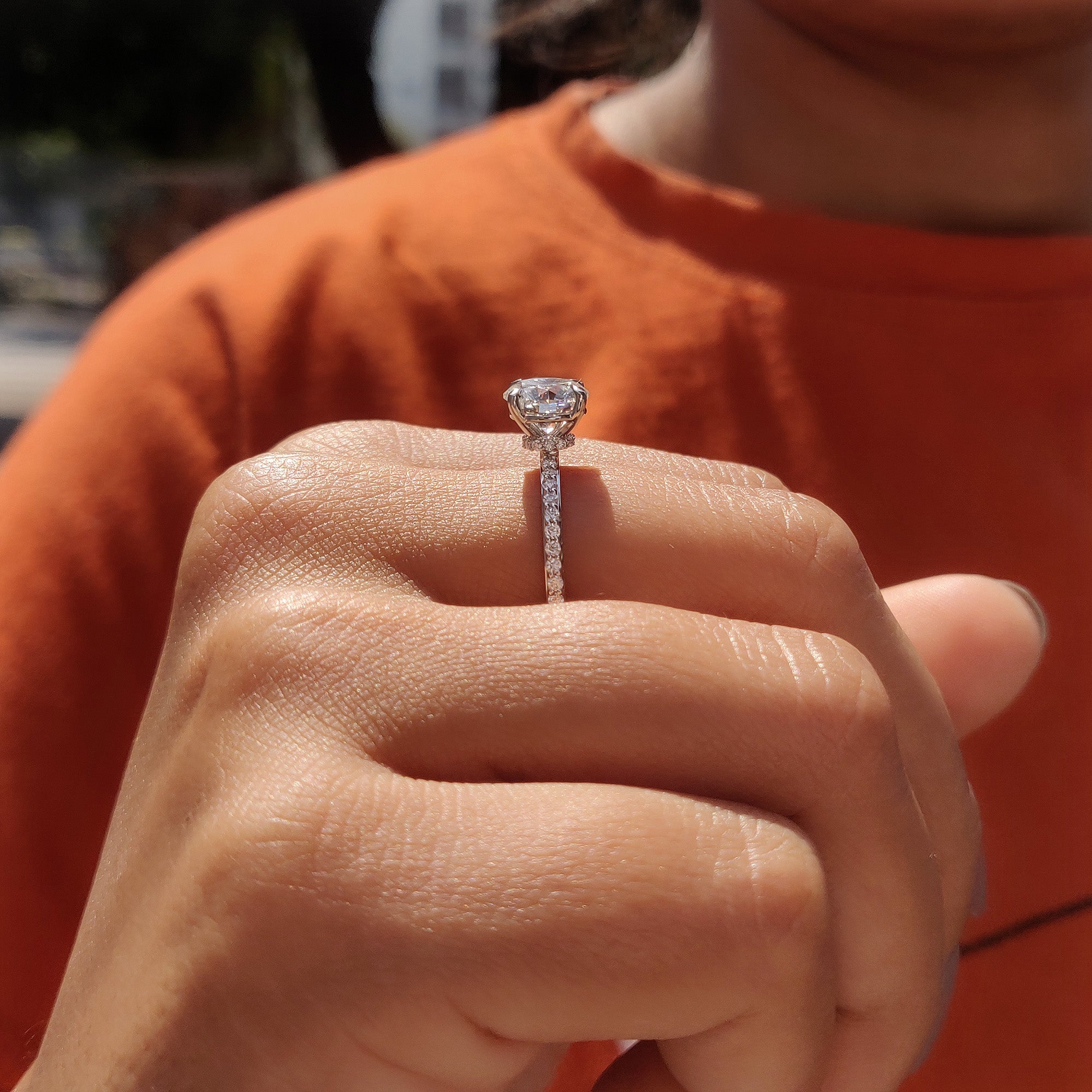 This hidden halo pave ring setting enhances the sparkle with small pave stones.
