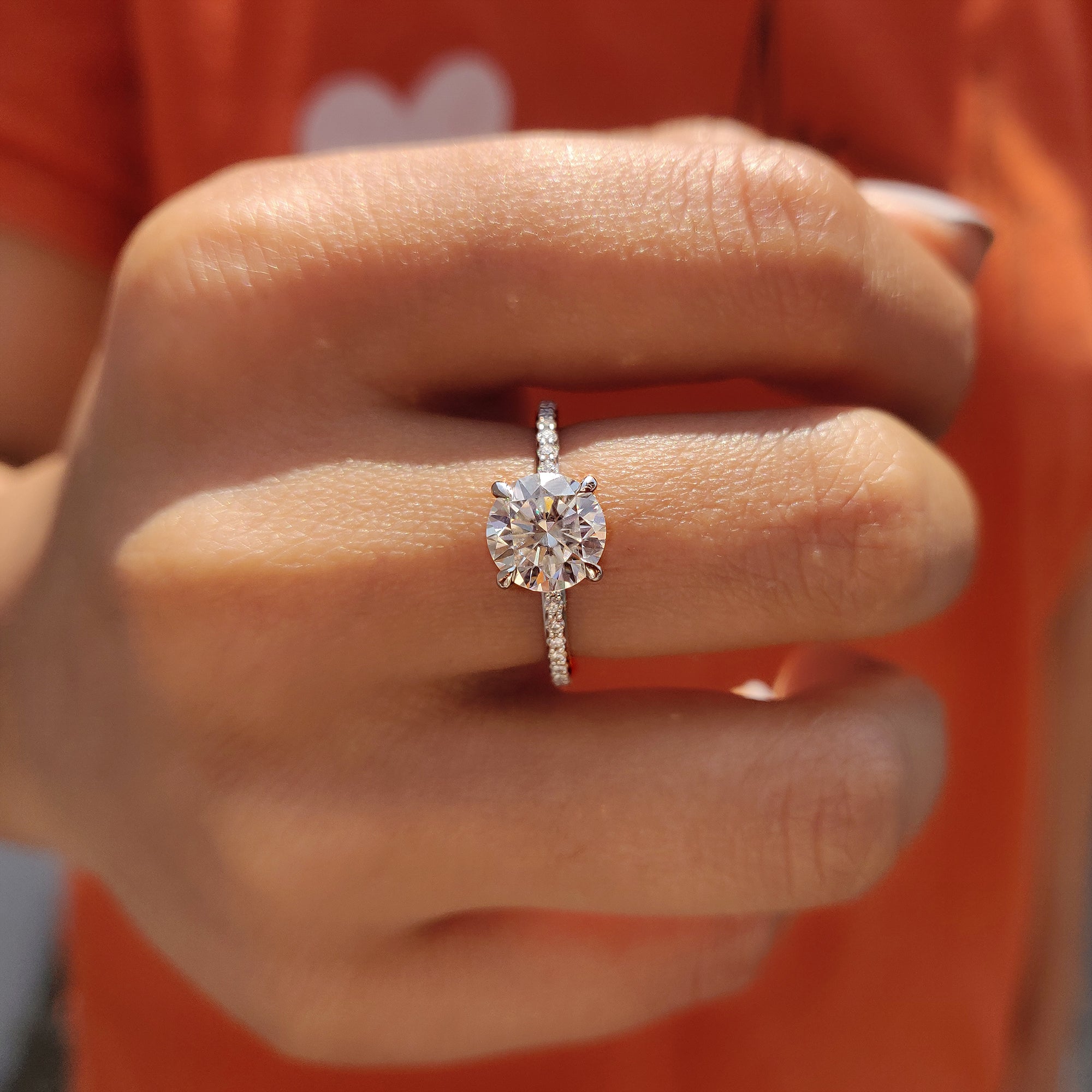 A moissanite ring in white gold offers a sleek, modern finish with a radiant gemstone.
