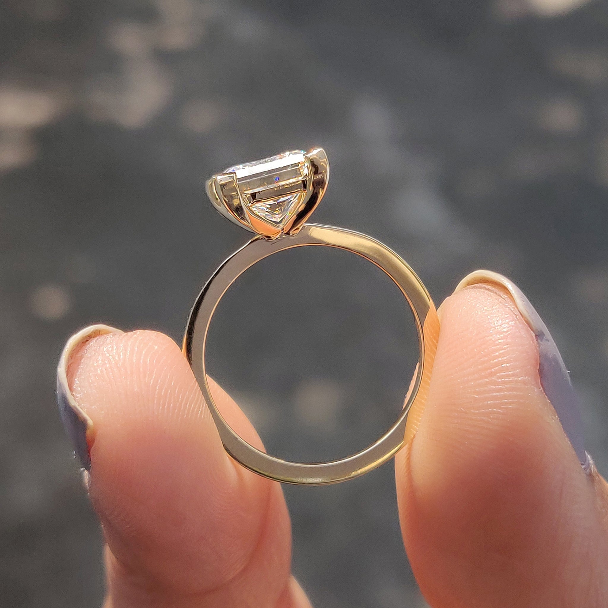 A solitaire setting ring offers a timeless and elegant look.
