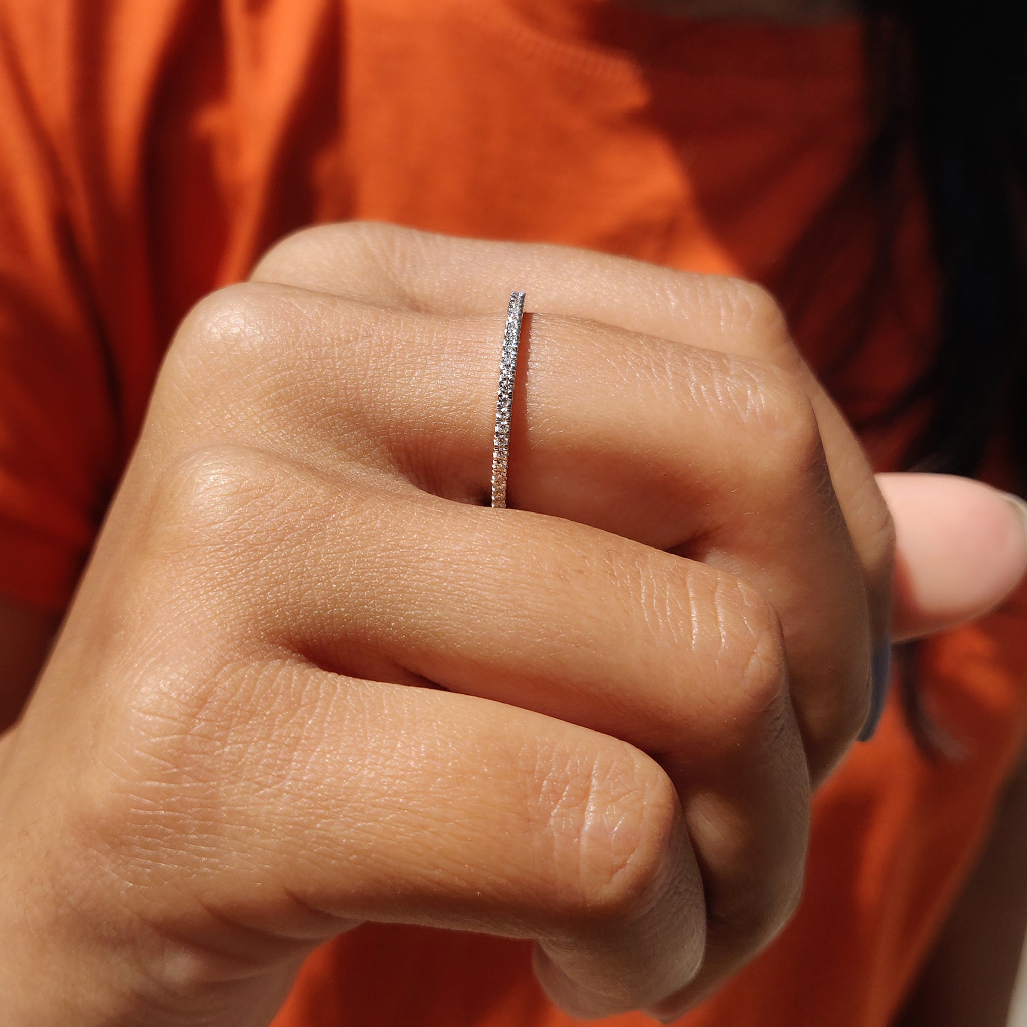 White gold moissanite band for elegant style.
