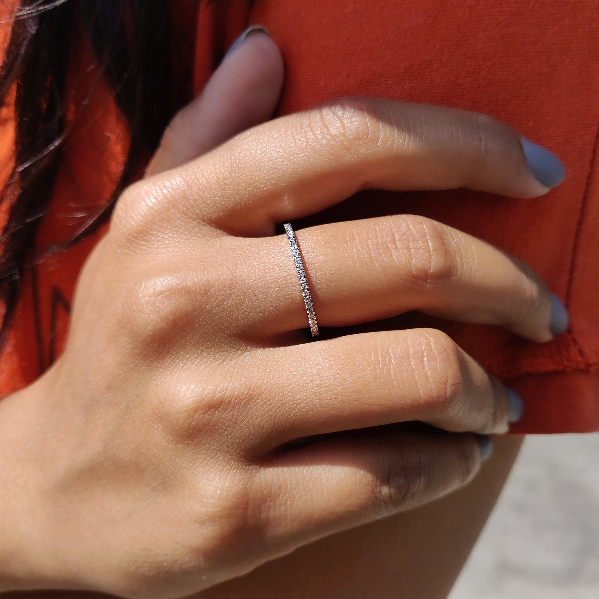 Carat diamonds band with round moissanite design.