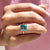 Moissanite engagement ring with elegant sparkle.
