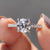 This engagement ring cathedral setting adds graceful height to the design.