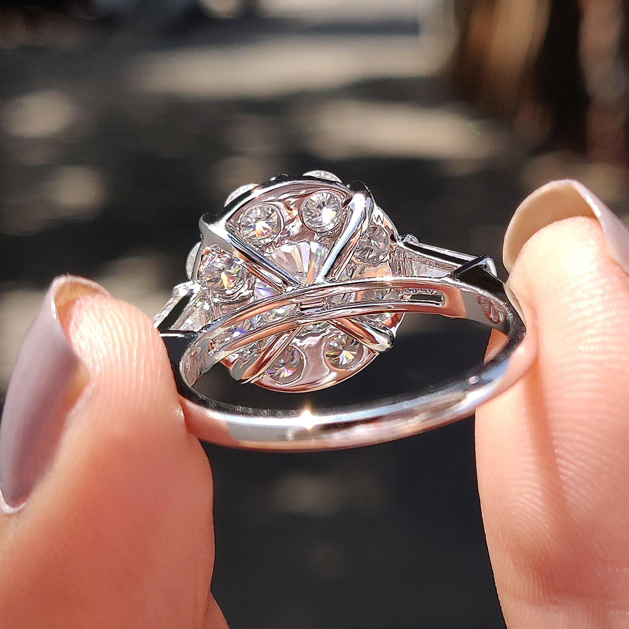 A 2 side baguette cut ring adds a unique and stylish touch.
