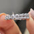 Emerald and round wedding band combining two cuts for a bold, stylish look in a seamless design.