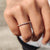 Minimalist wedding band in sleek design with a smooth finish.