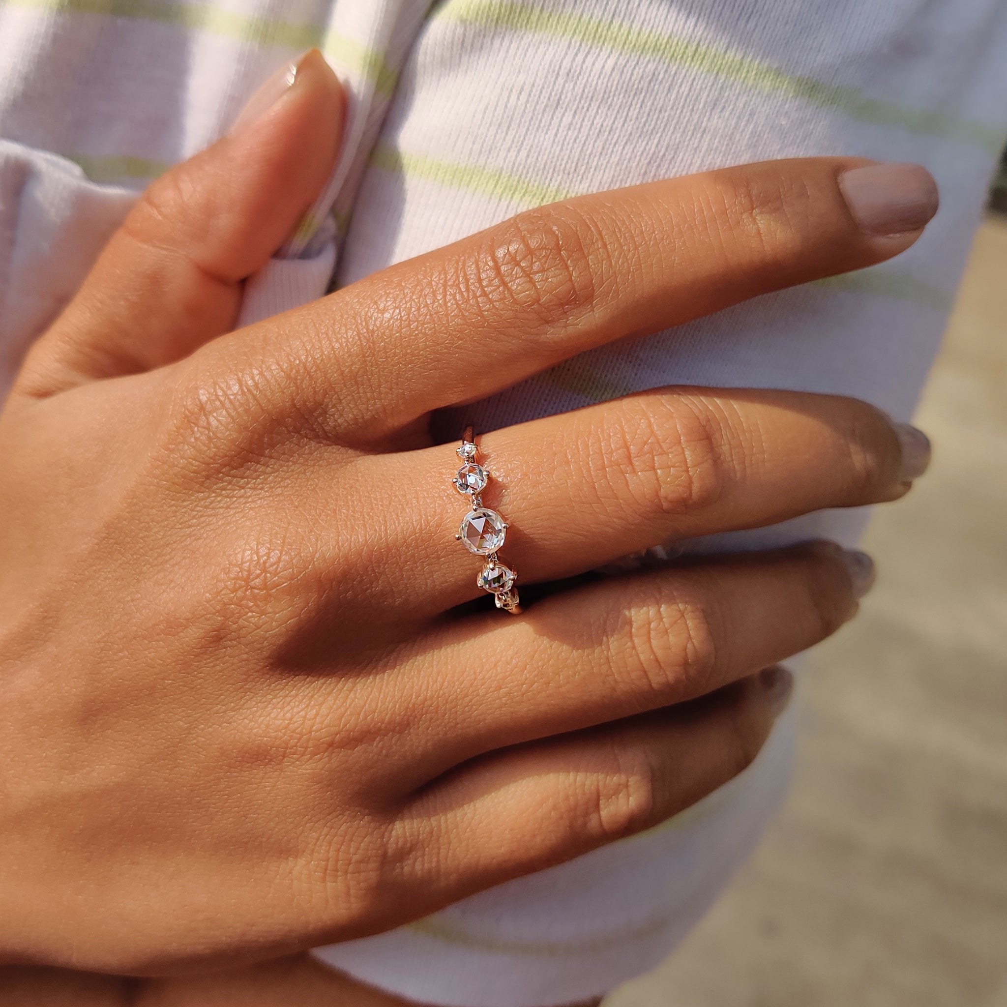 Moissanite ring set in a handcrafted rose gold band
