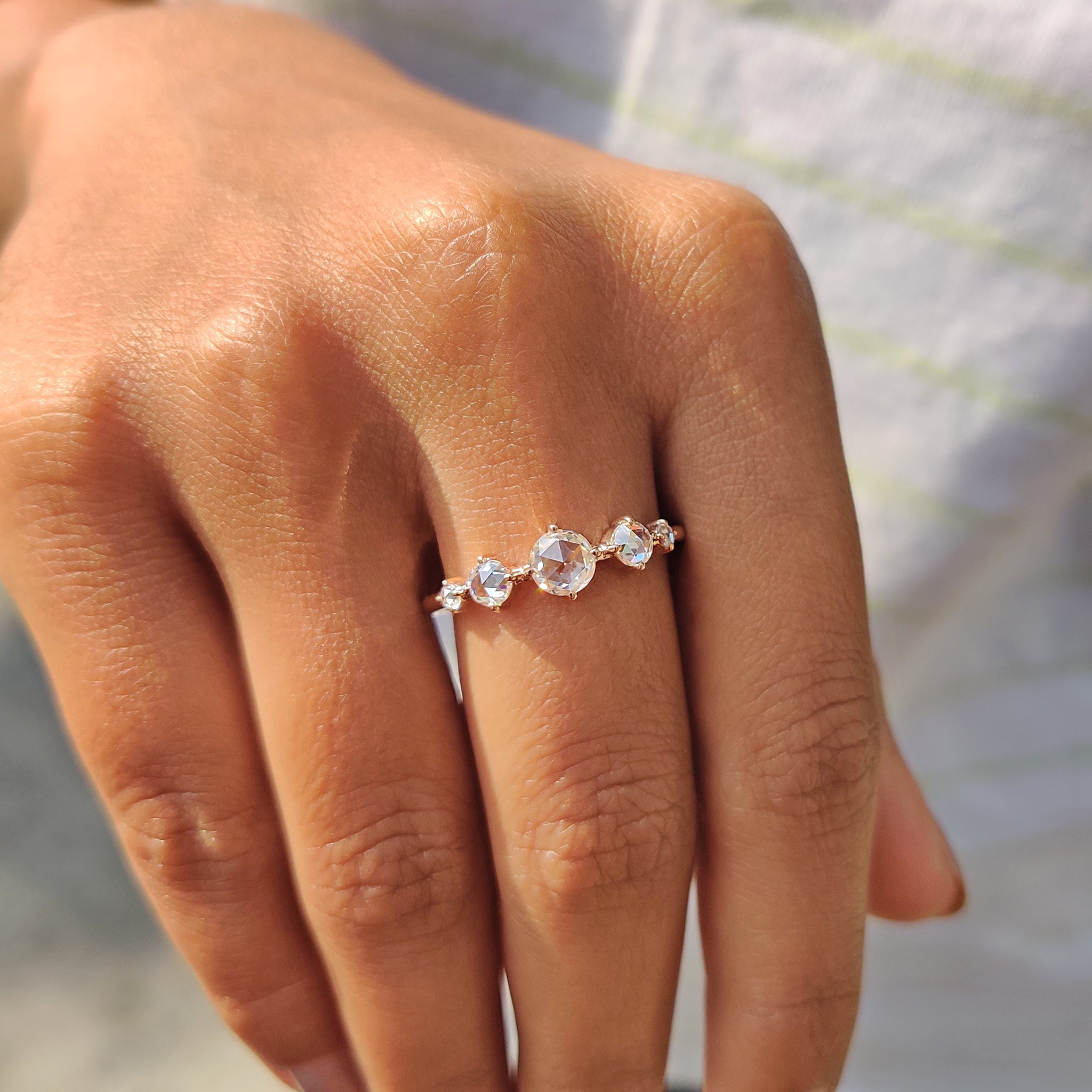 Handmade jewelry with a rose cut moissanite centerpiece
