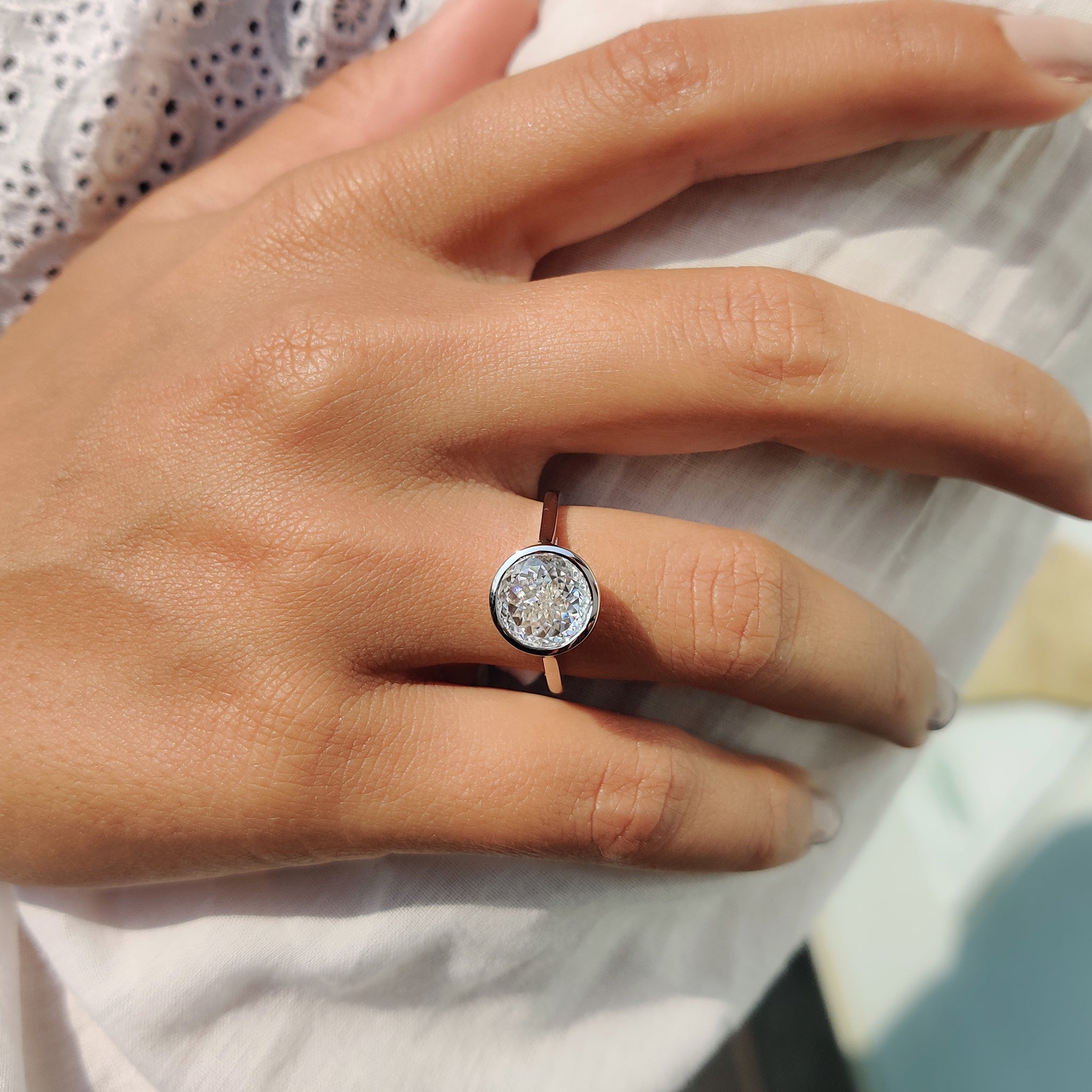 The Portuguese cut ring adds a unique, vintage-inspired style.
