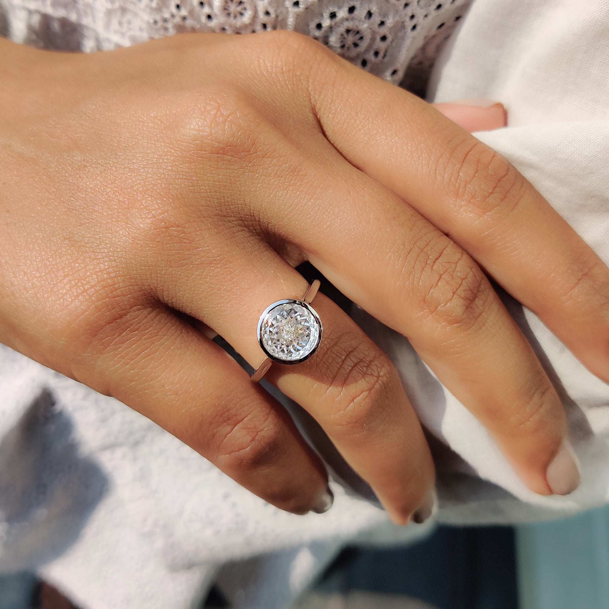 The white gold moissanite ring combines timeless elegance with modern appeal.
