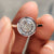 This bezel set engagement ring features a secure and sleek design.
