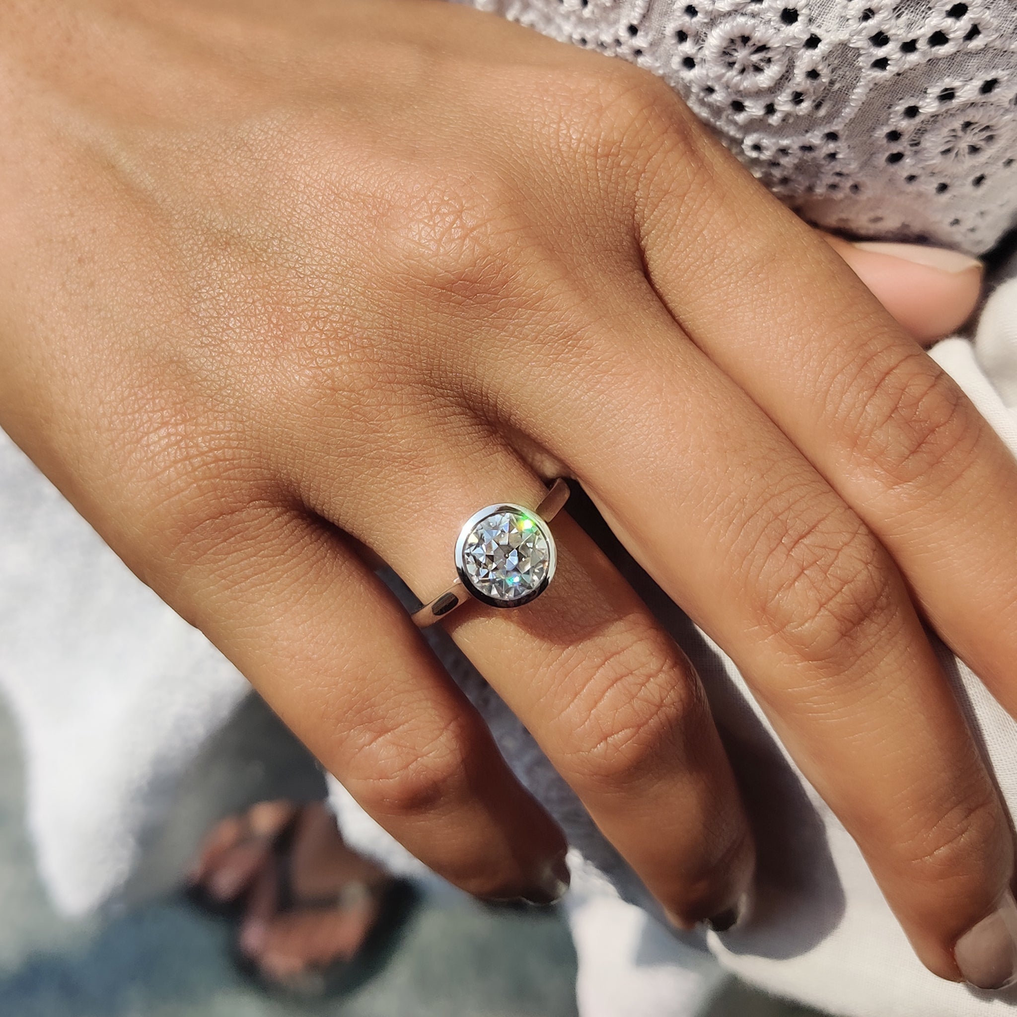 An old European cut engagement ring offers vintage charm and brilliance.
