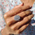 The cluster engagement ring adds a bold sparkle with multiple stones.